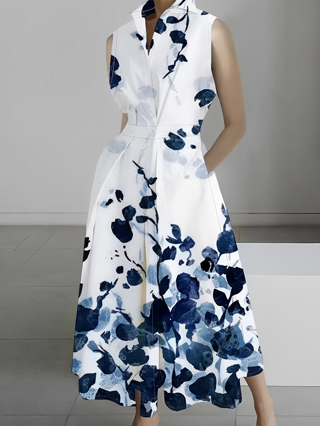 Elegant Sleeveless Floral Print Shirt Dress with Pockets - Chic A-Line Midi Dress for Women, White with Blue & Black Floral Design, V-Neck, Button-Up Front, Perfect for Casual or Office Wear, Cute Dress
